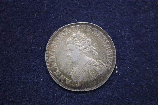 A silver sixpence 1790 Pattern by Droz, GEF and an England and Union of Scotland 1707 silver medal by J. Croker, F